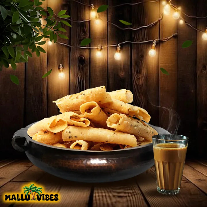 Front view of Mallu Vibes Homemade Fresh kuzhalappam in a bowl , english - Online Kerala snacks crispy rice tubes