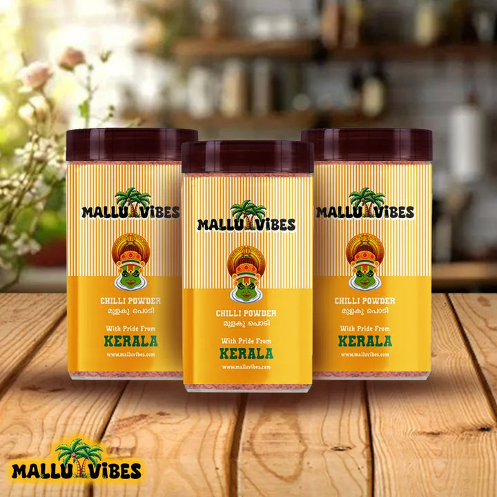 Front view of package design for Homemade Kerala snacks red chilli powder, adding heat and spice to dishes, malayalam - Freshly Made Kerala snacks mulaku podi