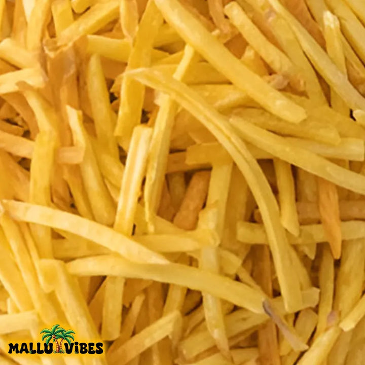 Top View of Kerala souvenirs crispy Tapioca chips golden and crunchy in a bowl, malayalam - Indian snacks kappa upperi