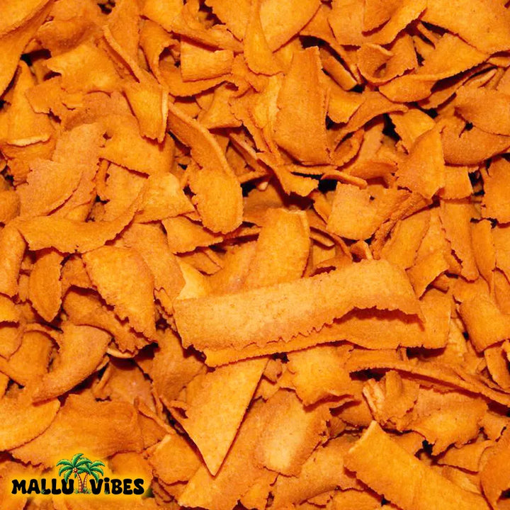 Top view of Authentic Kerala snacks pakkavada in a bowl, english - Homemade Kerala snacks ribbon shaped pakkoda