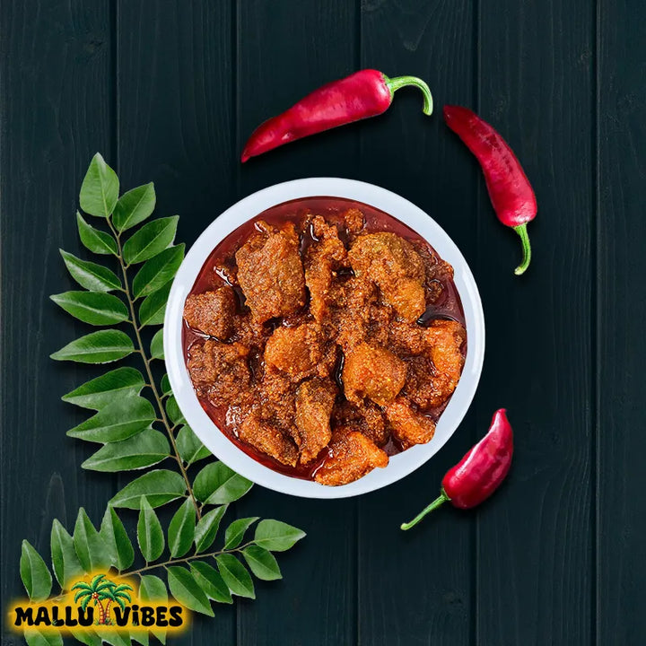 Top view of Mallu Vibes Homemade Kerala pickles. Homemade Fresh fish pickles and No Preservatives with spicy, malayalam - meen achar