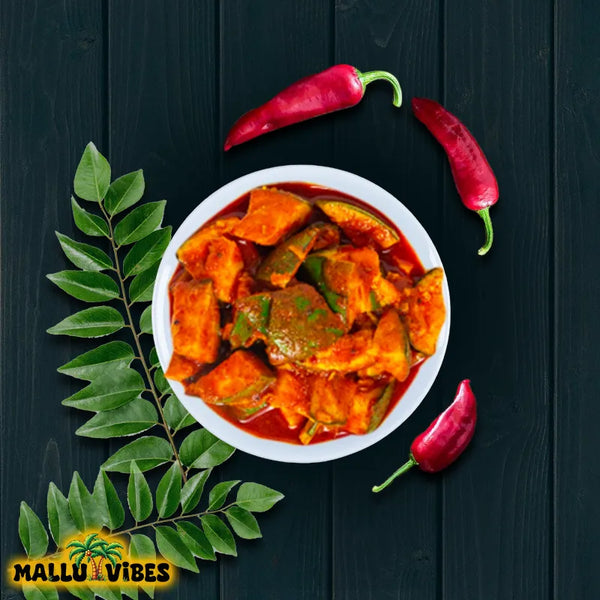 Top view of Mallu Vibes Homemade Kerala pickles and No Preservatives Mango pickle with chunks of ripe mangoes, malayalam - manga achar