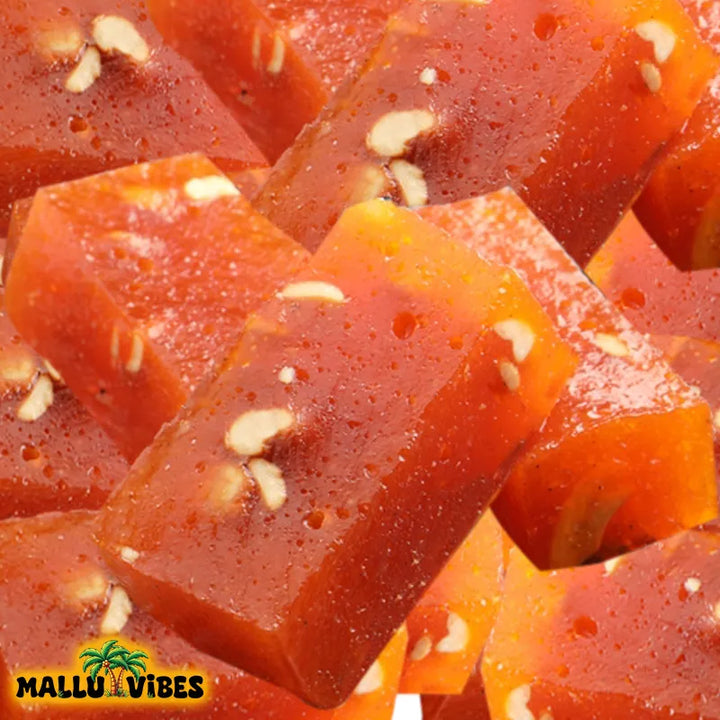 Top view of Mallu Vibes Natural Kerala snacks kerala aluva with cashews and ghee in a bowl, malayalam - Homemade Fresh kerala halwa