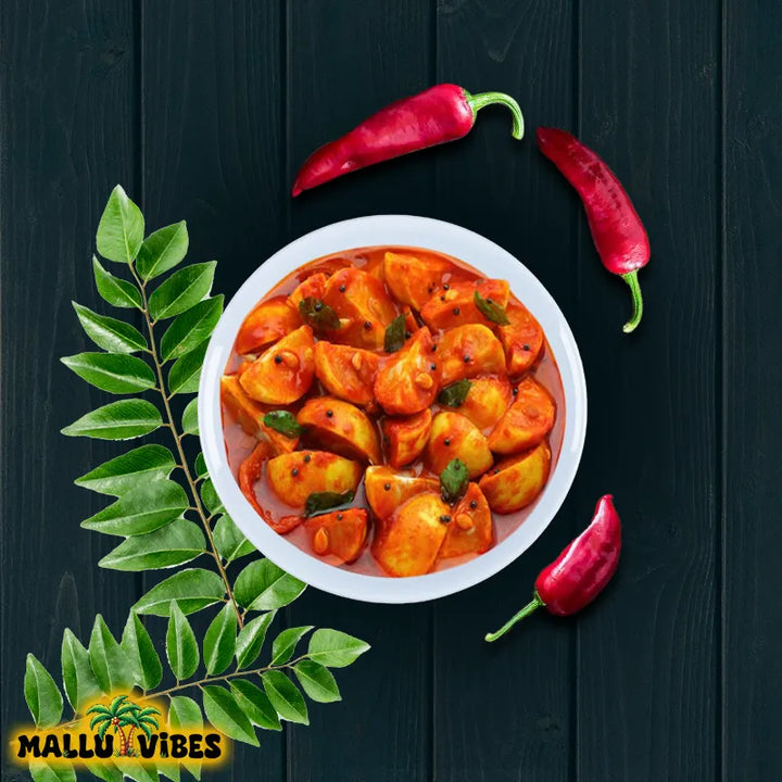 Top view of Mallu Vibes lime Kerala pickles with vibrant yellow green limes Homemade Kerala pickles and No Preservatives, malayalam - naranga achar