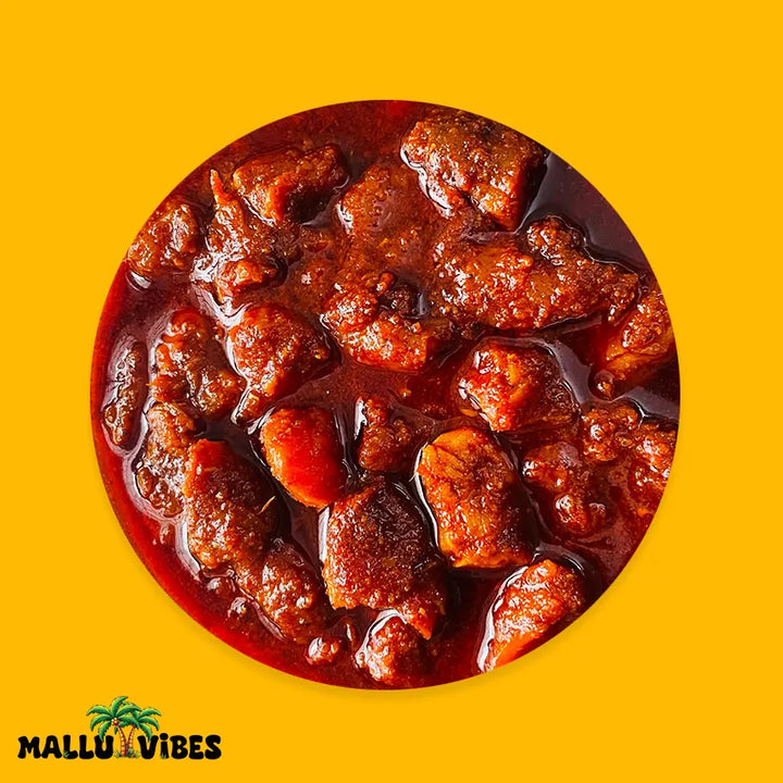 Top view of chicken pickle in a Kerala pickles rich spice blend with Homemade Kerala pickles, and No Preservatives, malayalam - Homemade Fresh kozhi achar