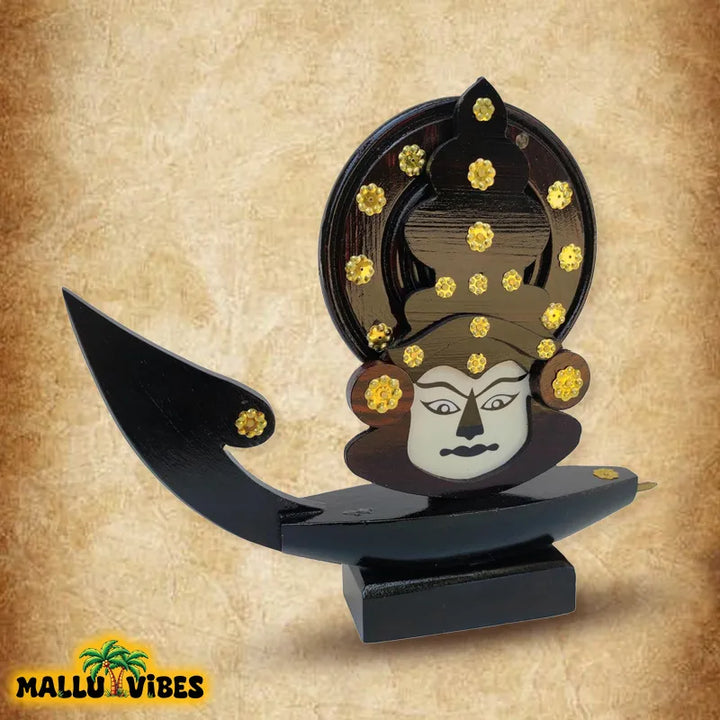 Left side view of Kerala arts and crafts wooden boat with kathakali face, english - Traditional Kerala art kathakali face